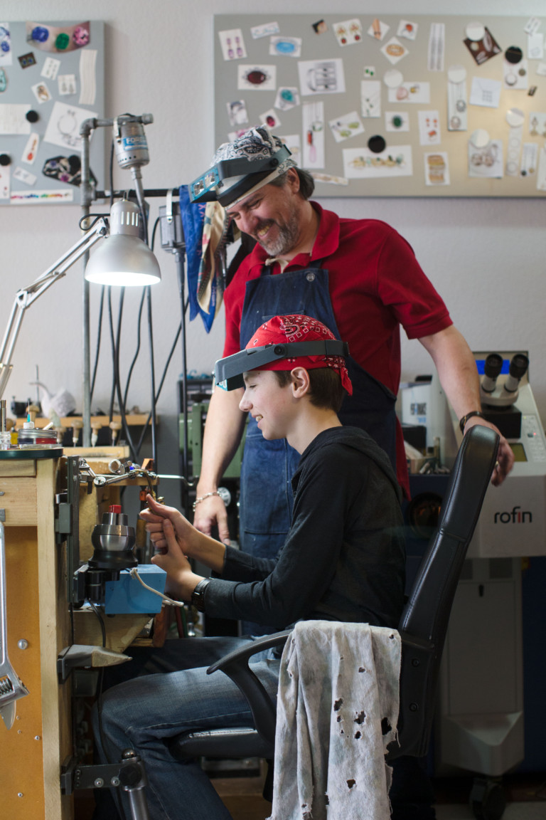 Elliott Hodson and dad making jewelry