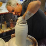 Randy O'Brien working on ceramic pottery